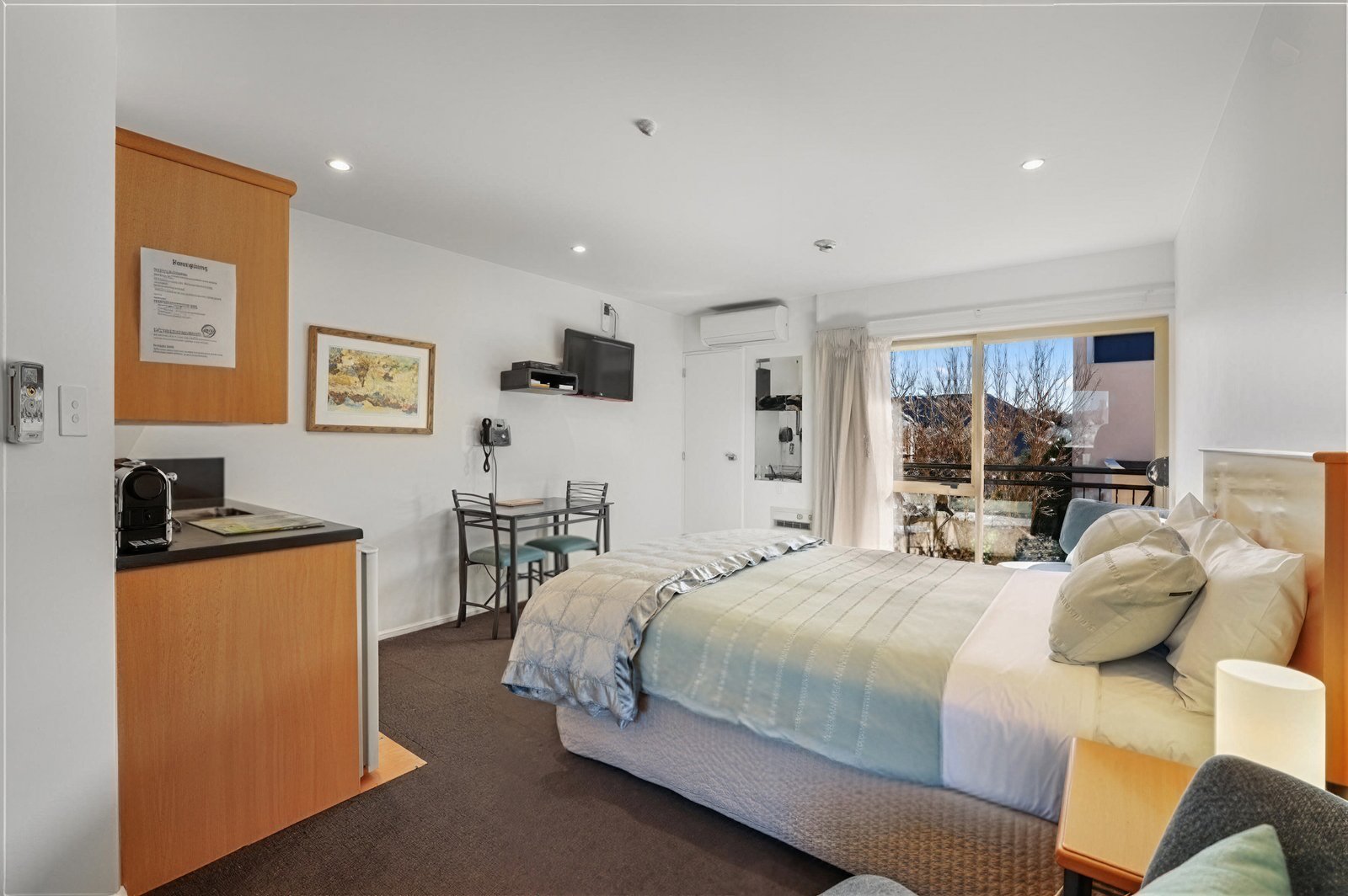 Deluxe Spa Suite with Balcony, queen bed, spa bath and private balcony