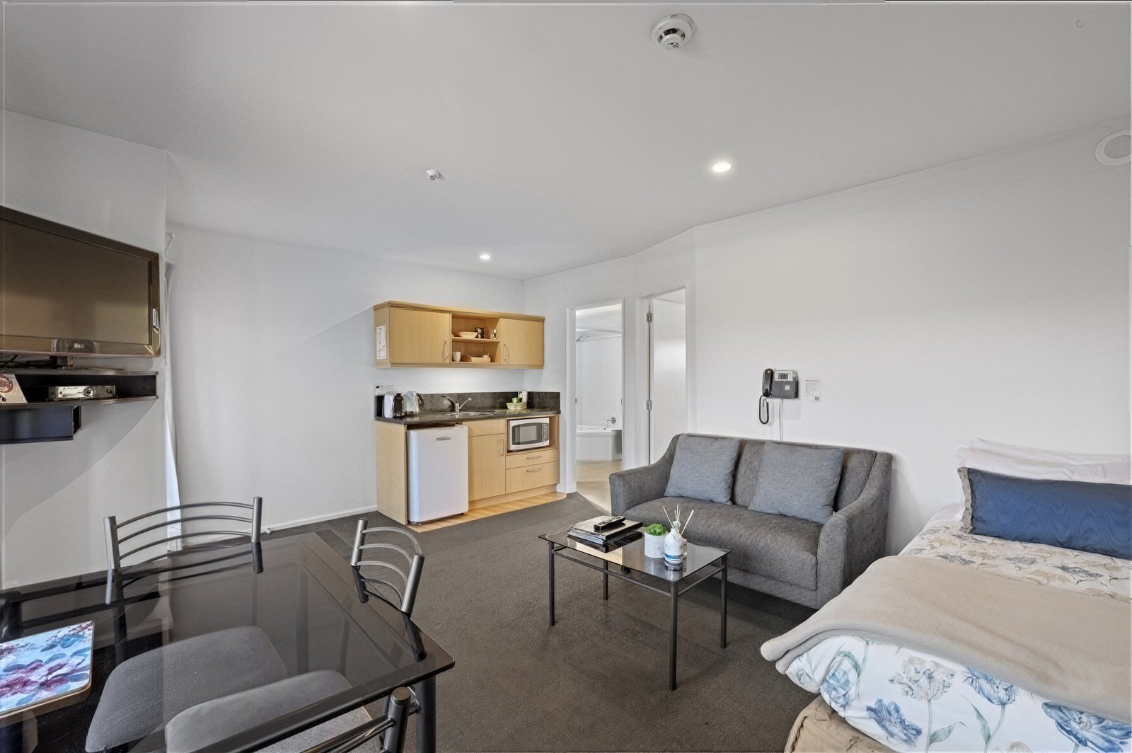 One-Bedroom Spa Suite, generous lounge, queen bed with single and private spa